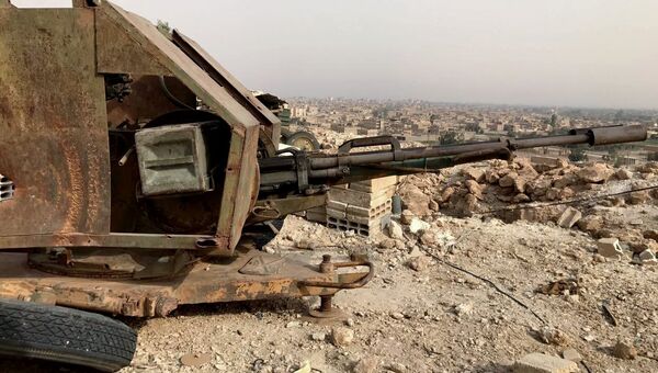 Район Джафра в Дейр-эз-Зоре во время наступления сирийской армии и бойцов народного ополчения. Архивное фото