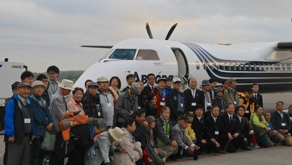 Пассажиры первого чартерного рейса из Японии на южные Курилы