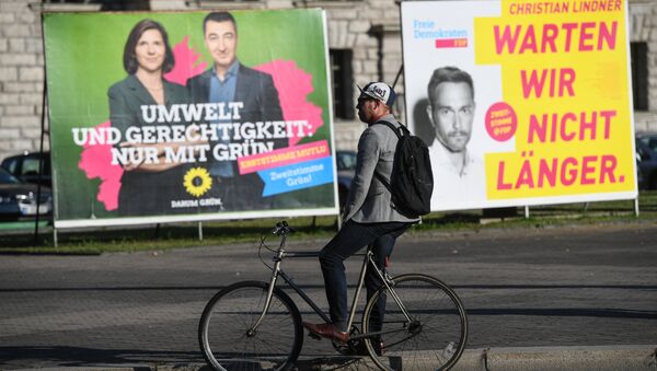 Предвыборная агитация на одной из улиц Берлина накануне парламентских выборов в Германии. 23 сентября 2017