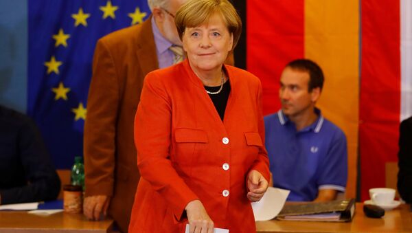 Федеральный канцлер Германии Ангела Меркель голосует на парламентских выборах в Берлине. 24 сентбяря 2017