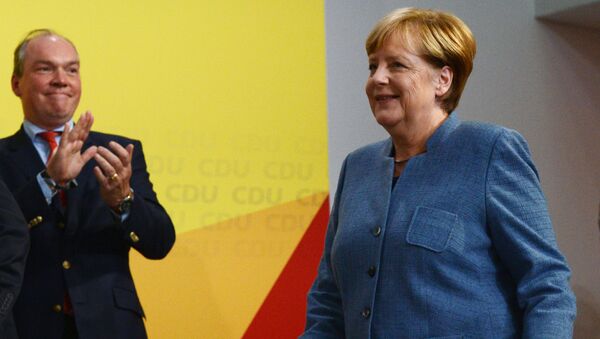 Канцлер Германии, лидер Христианско-демократического союза Ангела Меркель во время парламентских выборов в Берлине. Архивное фото17