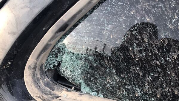 Машина, в которой находился попавший под обстрел в Сирии корреспондент РИА Новости. Архивное фото
