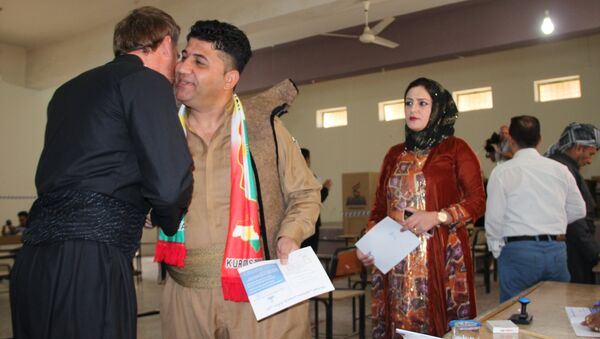 Жители на избирательном участке в городе Киркук во время референдума о независимости Иракского Курдистана. 25 сентября 2017