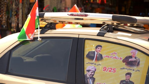 Агитационная наклейка на автомобиле, призывающая прийти на участки и проголосовать на референдуме о независимости Иракского Курдистана от Багдада, в Эрбиле. 23 сентября 2017