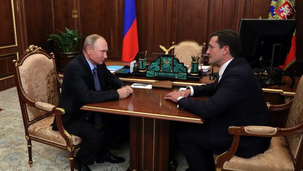 Владимир Путин и временно исполняющий обязанности губернатора Нижегородской области Глеб Никитин во время встречи. 26 сентября 2017