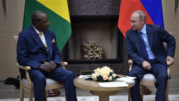 Президент Гвинейской Республики, действующий председатель Африканского союза Альфа Конде и  Владимир Путин во время встречи. 28 сентября 2017