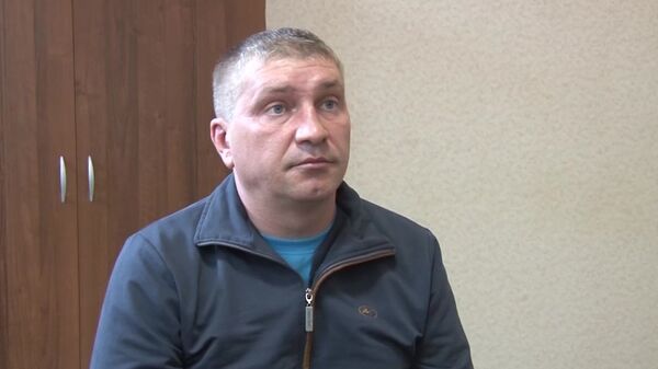 Дмитрий Долгополов, задержанный ФСБ РФ в Симферополе по обвинению в передаче спецслужбам Украины сведений, составляющих государственную тайну