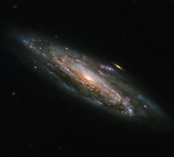 Cпиральная галактика NGC 5559 снятая Хабблом