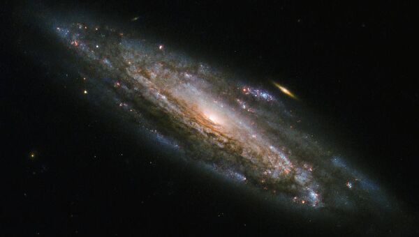 Cпиральная галактика NGC 5559 снятая Хабблом
