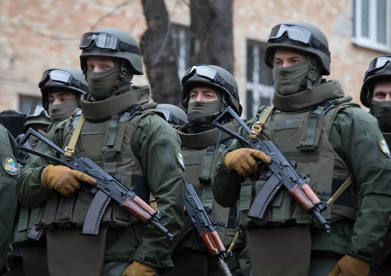 Сотрудники Управления специальных операций Национального антикоррупционного бюро Украины (НАБУ) во время церемонии принесения присяги в Киеве Сотрудники Управления специальных операций Национального антикоррупционного бюро Украины (НАБУ) во время церемонии принесения присяги в Киеве