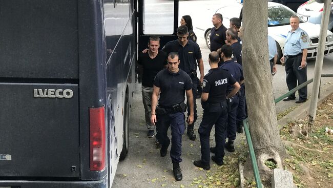 Александр Винник в сопровождении греческой полиции. Архивное фото