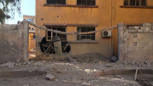 Последствия обстрела жилых районов в Сирии