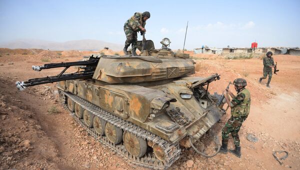 Бойцы зенитной самоходной установки Шилка на позиции у города Катана в провинции Дамаск. архивное фото