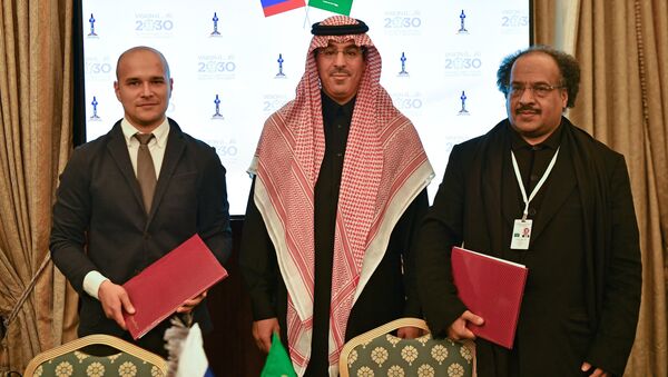 Антон Анисимов, Авад Бен Салех Аль-Авад и Насер Аль Хеджаилан после церемонии подписания протокола о намерениях