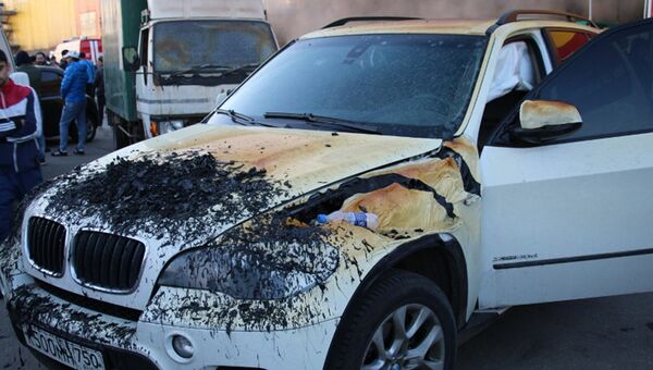 Машина, пострадавшая в результате пожара в торговом комплексе Синдика. 8 октября 2017