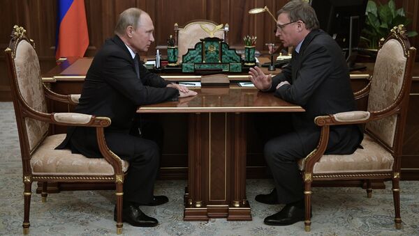 Владимир Путин и временно исполняющий обязанности губернатора Омской области Александр Бурков во время встречи. 9 октября 2017