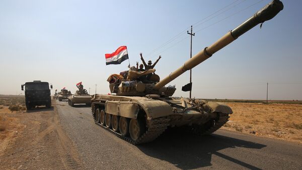 Иракские военные направляются к курдским позициям на южной окраине Киркука, Ирак