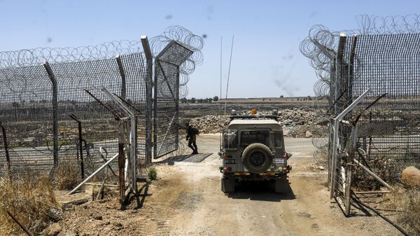 Израильские военные возле израильско-сирийской границы. Архивное фото