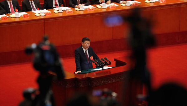Си Цзиньпин выступает на открытии 19-го съезда Коммунистической партии Китая. 18 октября 2017