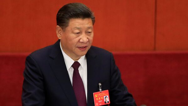 Си Цзиньпин выступает на открытии 19-го съезда Коммунистической партии Китая. 18 октября 2017