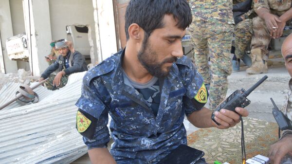 Бойцы курдских отрядов самообороны в Ракке