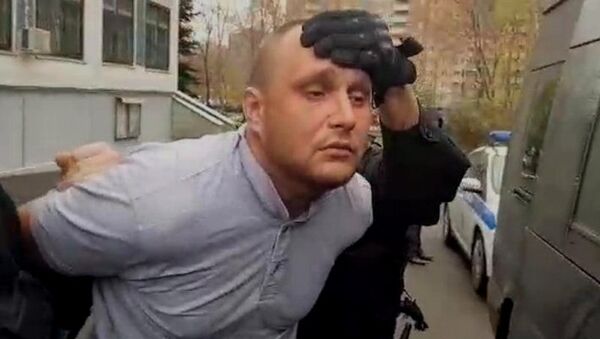 Александр Масленников во время задержания