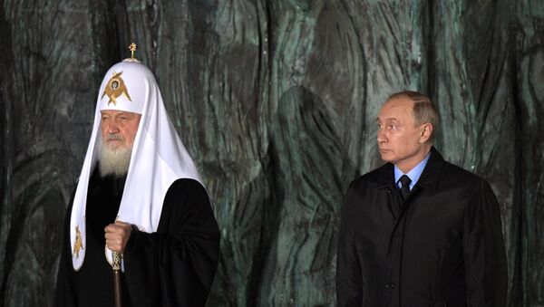 Президент Путин и патриарх Кирилл приняли участие в церемонии открытия мемориала Стена скорби