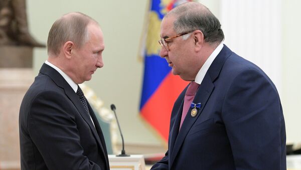 Президент РФ Владимир Путин и бизнесмен, основатель USM Holdings Алишер Усманов. Архивное фото