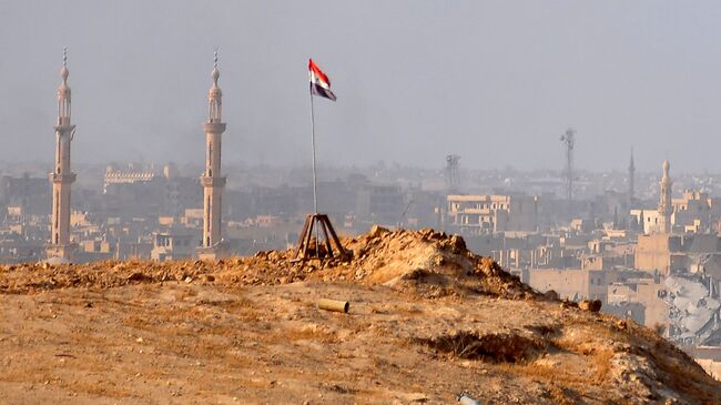 Вид Дейр-эз-Зора во время операции сирийской армии против террористов. Архивное фото.