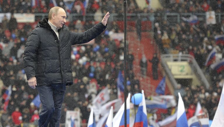 Премьер-министр РФ Владимир Путин выступает на митинге Защитим страну! в спорткомплексе Лужники