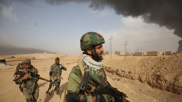 Военнослужащие шиитского ополчения Ирака в городе Эль-Каим. Архивное фото
