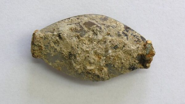 Обнаруженный в Пилосе камень с выгравированной сценой битвы