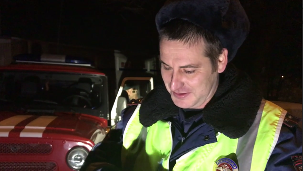 Андрей Уржаткин рядом с местом пожара. 9 ноября 2017