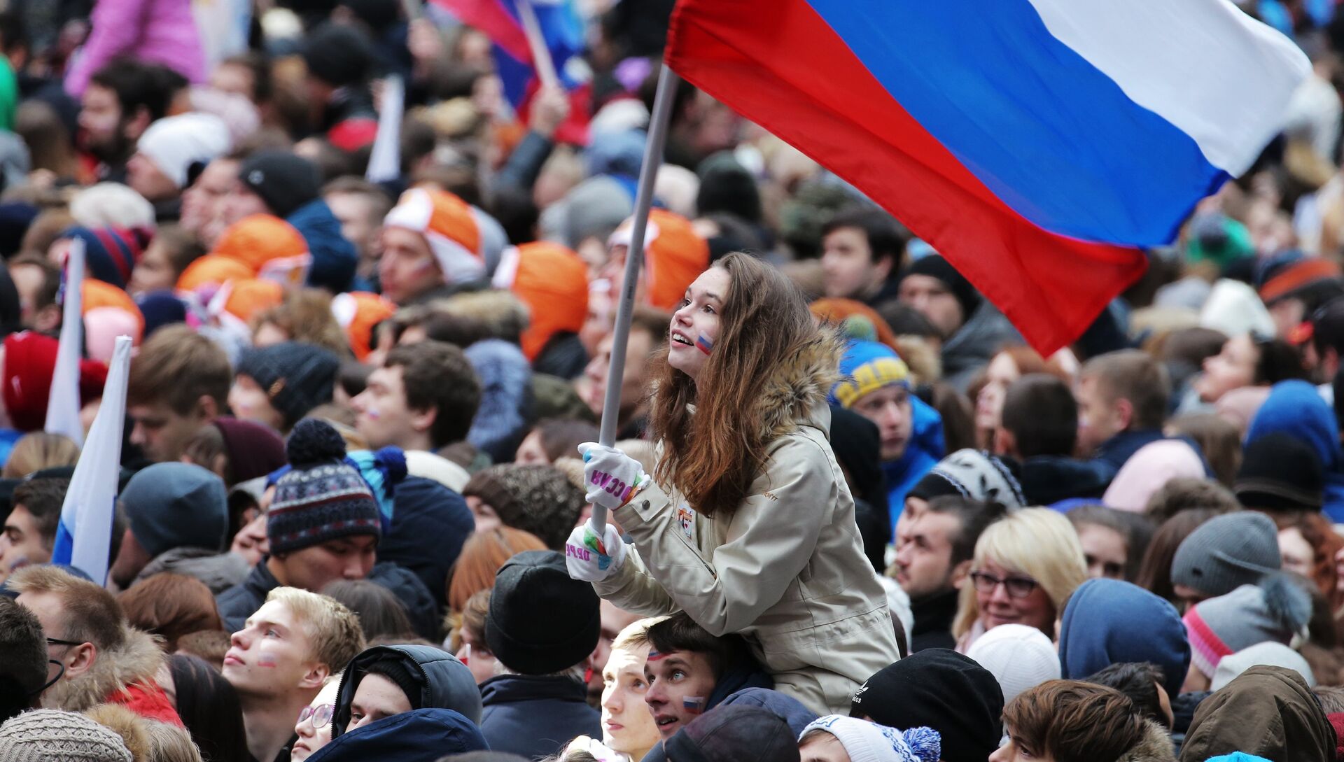 Посетители перед началом митинг-концерта Россия объединяет! на большой спортивной арене Лужники в Москве - РИА Новости, 1920, 28.12.2017