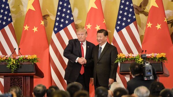 Президент США Дональд Трамп и председатель Китая Си Цзиньпин в Большом зале народа в Пекине. 9 ноября 2017 года