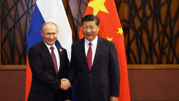 Президент РФ Владимир Путин и председатель КНР Си Цзиньпин на саммите АТЭС. 10 ноября 2017