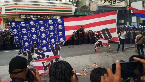 Акция протеста против визита президента США Дональда Трампа в Маниле, Филиппины. 12 ноября 2017