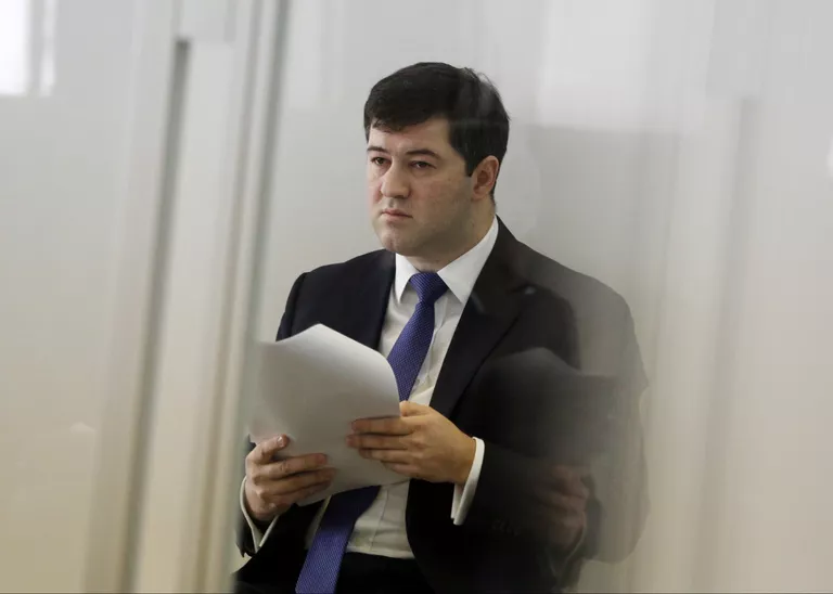 Глава государственной фискальной службы Украины Роман Насиров во время судебного заседания в Киеве. 13 марта 2017 Глава государственной фискальной службы Украины Роман Насиров во время судебного заседания в Киеве. 13 марта 2017