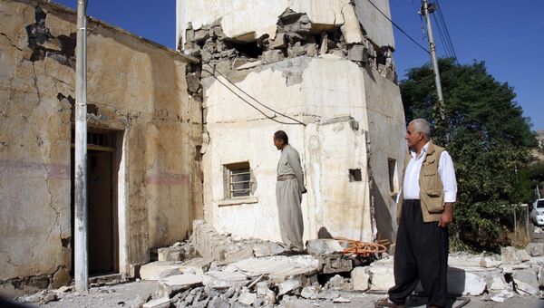 Поврежденное здание после землетрясения в городе Дарбандихан, Ирак. Архивное фото