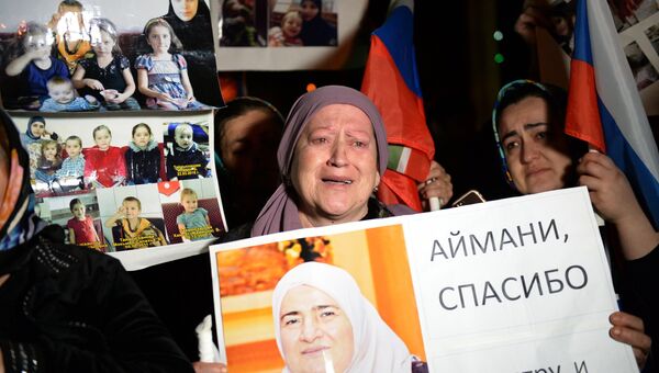 Встреча российских детей и женщин, возвращенных из Сирии, в аэропорту Грозного