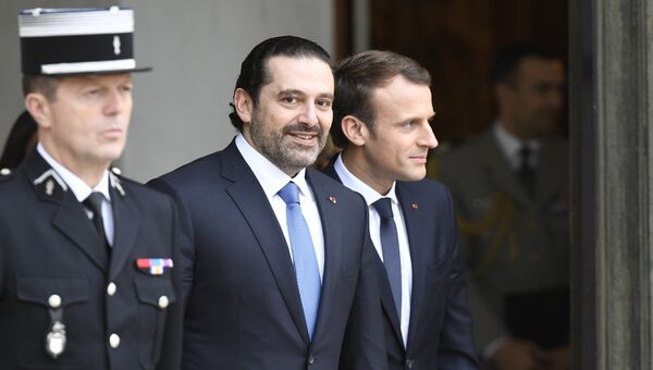 Президент Франции Эммануэль Макрон и премьер-министр Ливана Саад Харири после встречи в Елисейском дворце. 18 ноября 2017