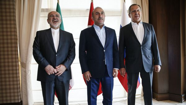 Главы МИД Ирана, Турции и России на встрече в Анталье. 19 ноября 2017
