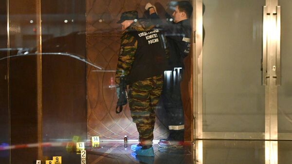Сотрудники правоохранительных органов проводят следственные действия на месте драки со стрельбой неподалеку от комплекса Москва-сити в Москве. Архивное фото