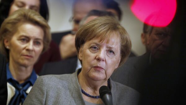 Лидер ХДС, канцлер Германии Ангела Меркель во время пресс-конференции по итогам переговоров о формировании коалиционного правительства в Берлине