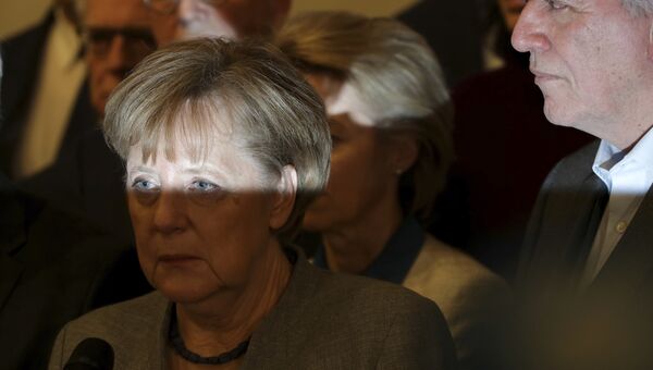 Канцлер Германии Ангела Меркель во время объявления результатов переговоров о формировании новой коалиции. 20 ноября 2017