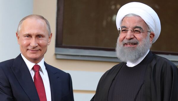 Президент РФ Владимир Путин и президент Ирана Хасан Рухани перед началом трехсторонней встречи с президентом Турции Реджепом Тайипом Эрдоганом. 22 ноября 2017