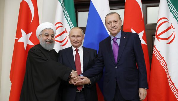 Владимир Путин, президент Ирана Хасан Рухани и президент Турции Реджеп Тайип Эрдоган во время встречи. 22 ноября 2017