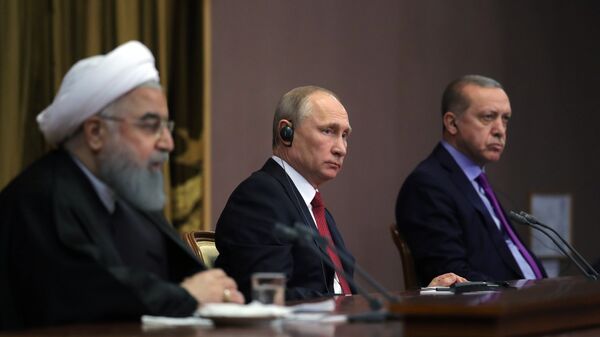 Владимир Путин, президент Ирана Хасан Рухани и президент Турции Реджеп Тайип Эрдоган во время совместного заявления для прессы по итогам встречи. 22 ноября 2017