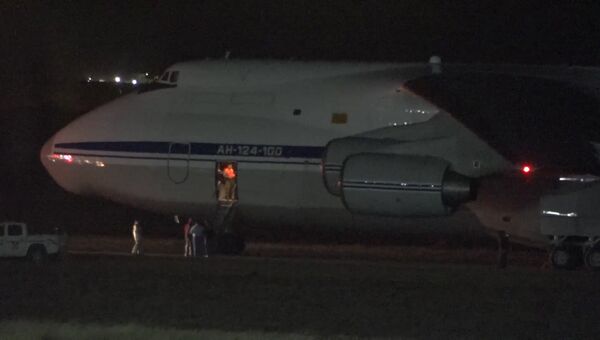 Приземление российского самолета с оборудованием для поиска подлодки Сан-Хуан