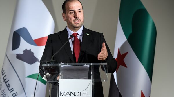 Глава Сирийской оппозиционной партии Наср аль-Харири на пресс-конференции накануне нового раунда мирных переговоров в Женеве. 27 ноября 2017